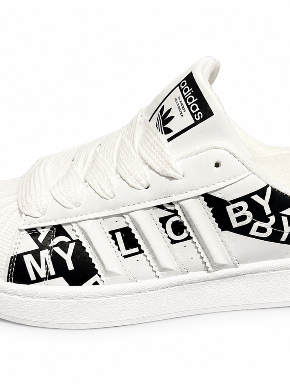 Woman White and Black Graphic Low-Top Sneakers